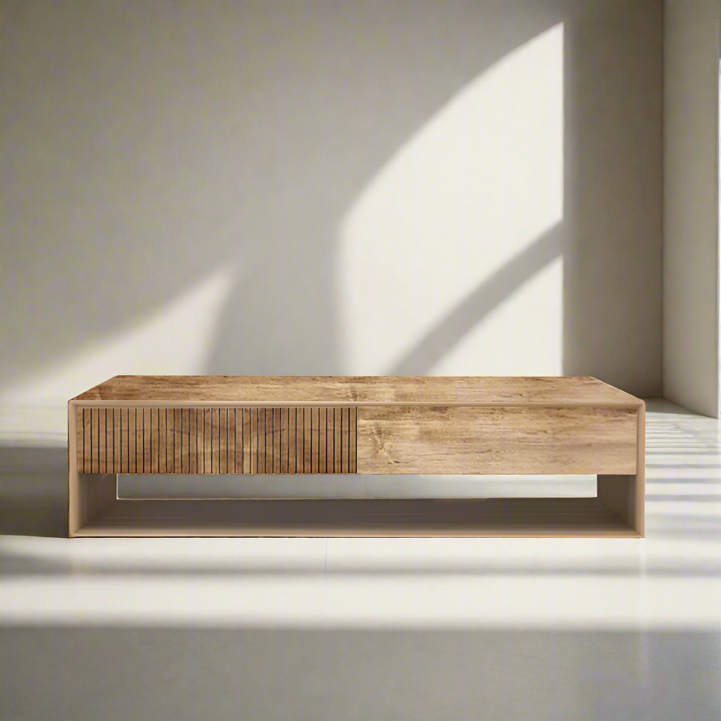 A rectangular solid wood coffee table with a visible grain pattern, placed in a room with natural lighting.