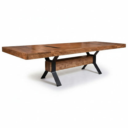 Wooden dining table with black metal legs on a white background