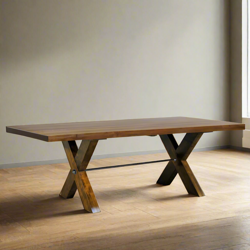 Wooden dining table with X-shaped legs on a white background