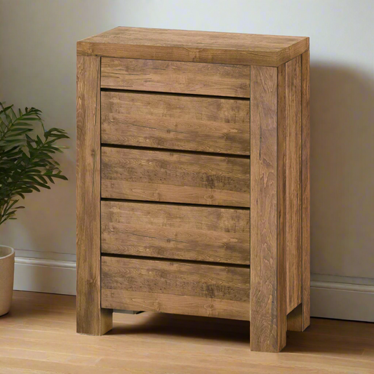Wooden side table with three drawers on a white background