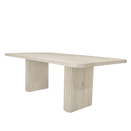 A rectangular solid wood dining table with a smooth finish and antique cloud wood texture, featuring column-like legs.